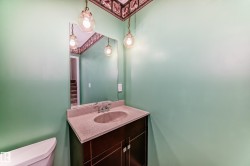 Bathroom with vanity and toilet - 