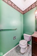 Half bathroom featuring vanity and a textured ceiling - 