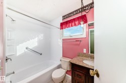 Full bathroom featuring vanity and shower / tub combination - 