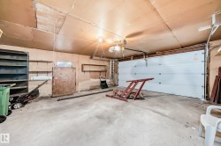 Garage featuring a garage door opener - 