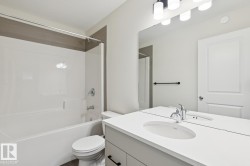 Full bath with vanity and bathing tub / shower combination - 