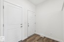 Entryway featuring baseboards and dark wood-type flooring - 407 26 Street, Edmonton, AB  - Indoor Photo Showing Other Room 