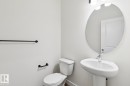 Bathroom with toilet and baseboards - 407 26 Street, Edmonton, AB  - Indoor Photo Showing Bathroom 