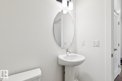 Bathroom featuring toilet - 407 26 Street, Edmonton, AB - Indoor Photo Showing Bathroom