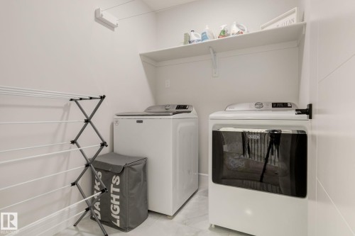 6456 King Wynd, Edmonton, AB - Indoor Photo Showing Laundry Room