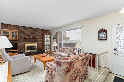 16016 102 Street, Edmonton, AB - Indoor Photo Showing Living Room With Fireplace