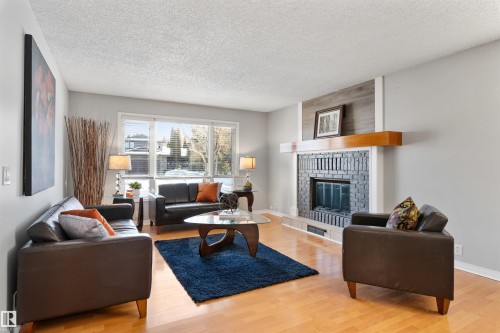 40 Windsor Crescent, St. Albert, AB - Indoor Photo Showing Living Room With Fireplace