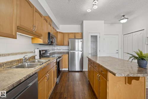415 12111 51 Avenue, Edmonton, AB - Indoor Photo Showing Kitchen With Double Sink