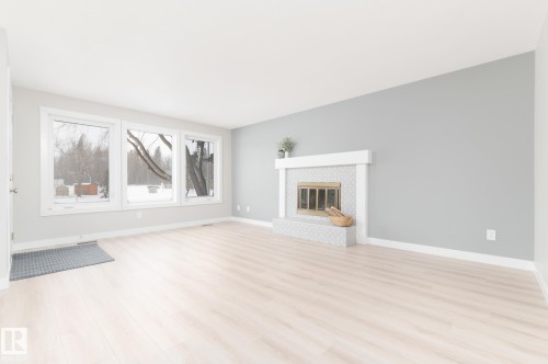 5 Brown Street, Stony Plain, AB - Indoor Photo Showing Living Room With Fireplace