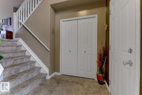 Entryway with stairway and baseboards - 20148 46 Avenue, Edmonton, AB - Indoor Photo Showing Other Room