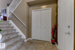 Entryway with stairway and baseboards - 