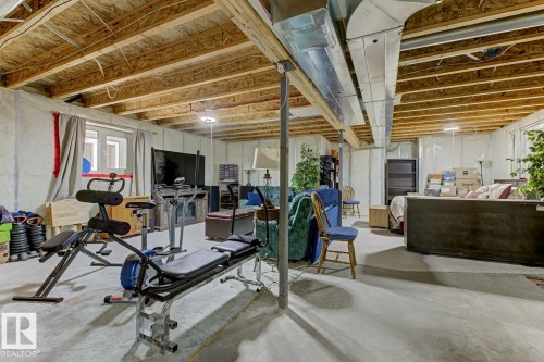 Exercise room featuring concrete flooring - 20148 46 Avenue, Edmonton, AB - Indoor