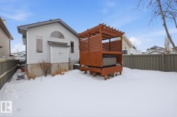 Snow covered house featuring a deck - 