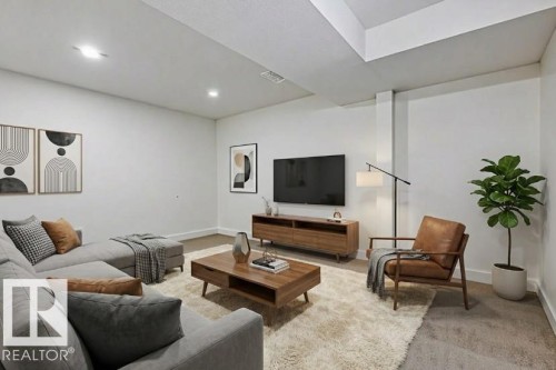 Living room with light colored carpet and baseboards - 13211 71 Street, Edmonton, AB - Indoor