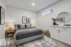 Bedroom with baseboards and light colored carpet - 