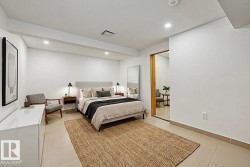 Bedroom featuring recessed lighting, beamed ceiling, and light tile patterned floors - 