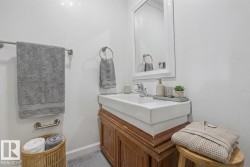 Bathroom featuring vanity and baseboards - 