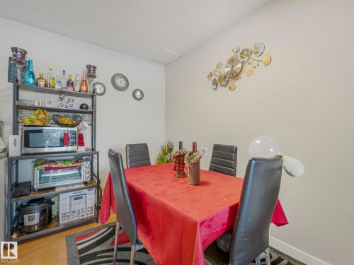 Dining area featuring baseboards - 13271 47 Street, Edmonton, AB - Indoor Photo Showing Dining Room