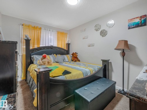 Carpeted bedroom with baseboards - 13271 47 Street, Edmonton, AB - Indoor Photo Showing Bedroom