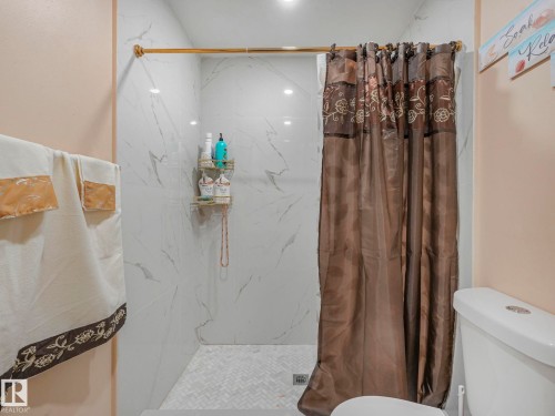 Bathroom with a marble finish shower - 13271 47 Street, Edmonton, AB - Indoor Photo Showing Bathroom