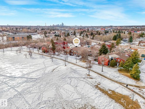 Snowy aerial view featuring a city view and a residential view - 13271 47 Street, Edmonton, AB - Outdoor With View
