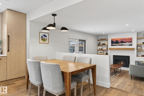632 Wahstao Road, Edmonton, AB - Indoor Photo Showing Dining Room With Fireplace