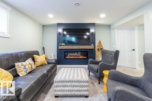 5 Lamplight Drive, Spruce Grove, AB - Indoor Photo Showing Living Room With Fireplace