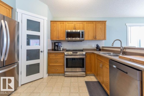 5 Lamplight Drive, Spruce Grove, AB - Indoor Photo Showing Kitchen With Double Sink