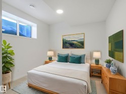 Carpeted bedroom featuring baseboards - 