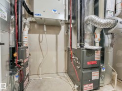 Utility room featuring heating unit - 