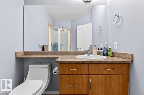 Bathroom with vanity and a shower stall - 105 9707 105 Street, Edmonton, AB - Indoor Photo Showing Bathroom
