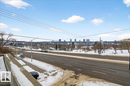 View of asphalt street with a view of skyline - 105 9707 105 Street, Edmonton, AB - Outdoor With View