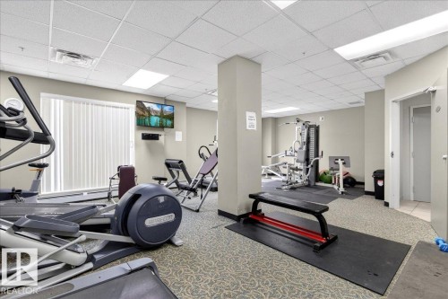 Exercise room with a paneled ceiling - 105 9707 105 Street, Edmonton, AB - Indoor Photo Showing Gym Room