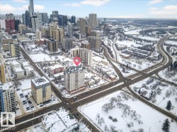 Snowy aerial view featuring a city view - 