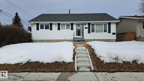 Ranch-style house featuring roof with shingles - 8512 131 Avenue, Edmonton, AB - Outdoor