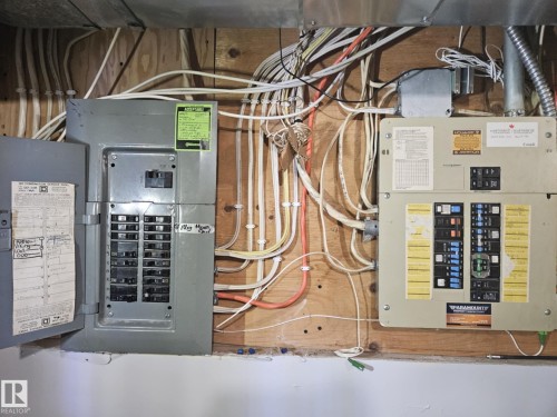 Utility room featuring electric panel - 8512 131 Avenue, Edmonton, AB - Indoor Photo Showing Basement