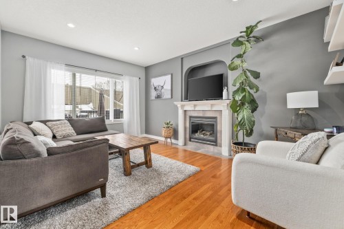 21 Huntington, Spruce Grove, AB - Indoor Photo Showing Living Room With Fireplace