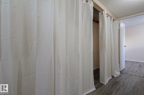 View of closet - 1526 69 Street Nw, Edmonton, AB - Indoor Photo Showing Bathroom