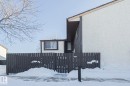 View of side of home featuring stucco siding - 1526 69 Street Nw, Edmonton, AB  - Outdoor 