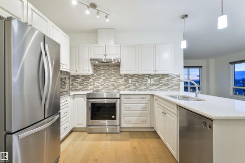 705 2755 109 Street, Edmonton, AB - Indoor Photo Showing Kitchen With Stainless Steel Kitchen With Double Sink With Upgraded Kitchen