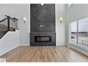 1527 Siskin Link Link, Edmonton, AB  - Indoor Photo Showing Living Room With Fireplace 