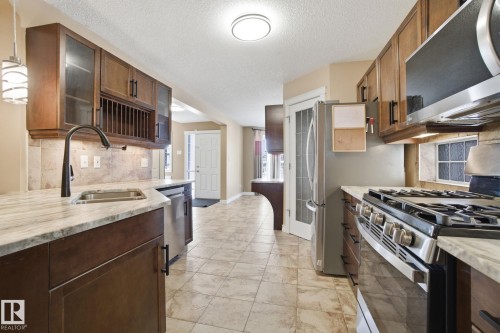 61 Suntree Promenade, Leduc, AB - Indoor Photo Showing Kitchen With Double Sink With Upgraded Kitchen