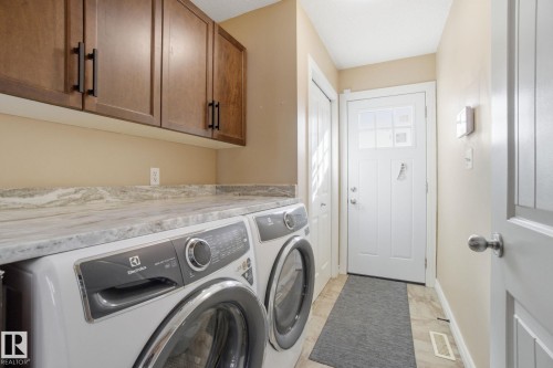 61 Suntree Promenade, Leduc, AB - Indoor Photo Showing Laundry Room