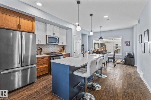 597 Meadowview Drive, Fort Saskatchewan, AB - Indoor Photo Showing Kitchen With Upgraded Kitchen