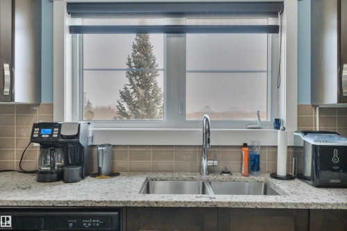 255 401 Southfork Drive, Leduc, AB - Indoor Photo Showing Kitchen With Double Sink With Upgraded Kitchen