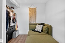 Living area featuring light wood-style flooring and baseboards - 