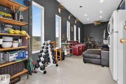 Interior space with concrete floors and a heating unit - 