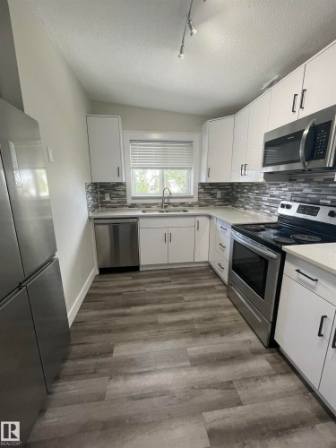 7604 7606 75 Street, Edmonton, AB - Indoor Photo Showing Kitchen With Double Sink