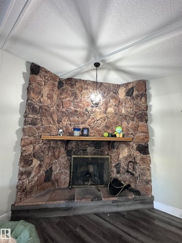 7604 7606 75 Street, Edmonton, AB - Indoor With Fireplace