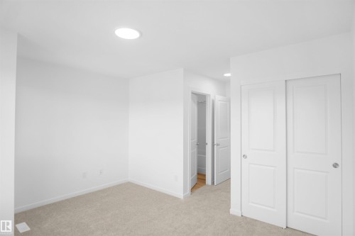 43 1009 Cy Becker Road, Edmonton, AB - Indoor Photo Showing Other Room